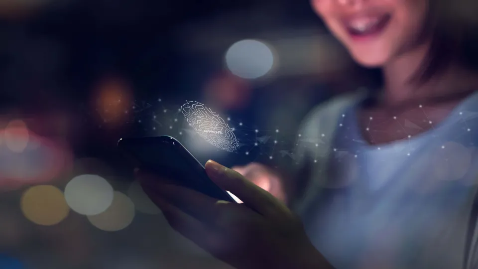 a girl is holding a phone